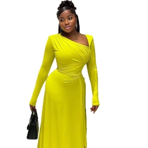 Elegant bright yellow long sleeve dress with asymmetric neck and pleated waist detailing