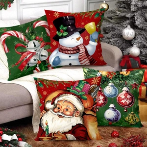 Set of 4 Christmas pillow covers with Santa and snowman prints on linen texture fabric