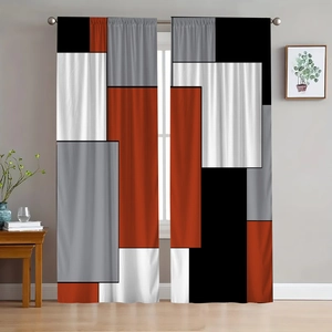Detail of geometric blackout curtain with rust, black and grey block pattern design