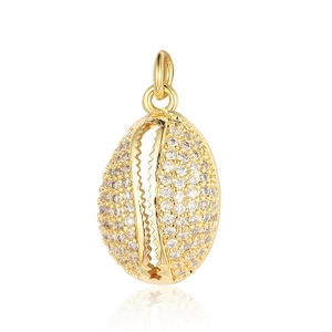 Macro detail of a gold shell-shaped pendant with sparkling pave zircon micro-inlays