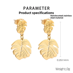 Close-up of golden stainless steel monstera leaf earrings with hollow vein details
