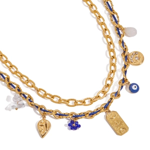 Bohemian gold layered necklace with blue rope, eye, heart, and flower charms