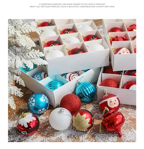 Detailed view of red and blue Christmas balls with festive patterns in a gift box