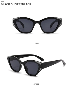 Close-up of geometric cat eye sunglasses with black frame and silver rhinestone accents