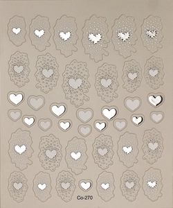Detail of silver 5D heart nail art stickers showing metallic irregular line patterns