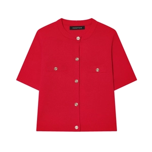 Detailed view of red short sleeve knit cardigan with textured gold buttons and ribbed hem