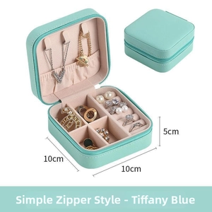 Detailed view of Tiffany blue mini jewelry box with 10x10x5cm size labels and zipper