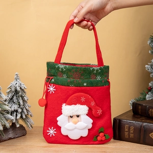 Christmas gift bag with Santa Claus motif in red and green felt for holiday presents