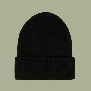 Detailed close-up showing the tight knit texture and wide folded cuff of the black beanie