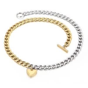 Two-tone silver and gold Cuban chain necklace with OT toggle clasp and heart pendant