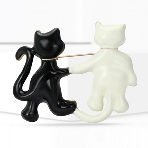 Cute Korean style black and white cat alloy brooch for women with gold trim finish