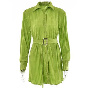 Relaxed grass green ruffled long-sleeve shirt with metal buckle belt and button-down front