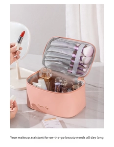 Pink PU leather makeup bag detail showing large capacity brush slots and interior space