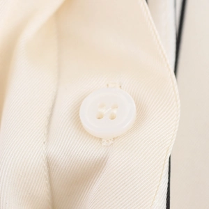 Minimalist beige satin blouse with high-quality white round button detail and twill fabric