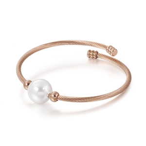 Bracelet jonc ouvert en fil d'acier or rose avec une grande perle de nacre blanche