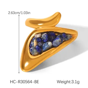 Detailed macro view of French vintage gold ring with irregular blue natural stones