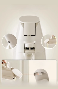 Close-up of the dual-use oil dispenser showing spray mechanism and leak-proof seal