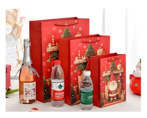 Detailed view of red Santa gift bags in three sizes with festive fireplace illustrations