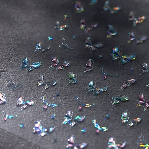 Holographic 3D butterfly nail art stickers with laser embossed gold effect on dark background