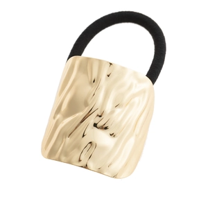 Minimalist gold alloy hair tie with textured rectangular metal plate and black elastic band