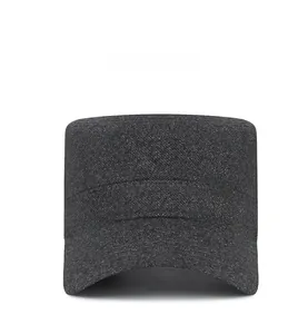 Front view of grey winter military cap with wool texture and metal triangle buckle detail