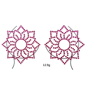 Macro detail of pink floral acrylic chest jewels XT-38 for party and rave decoration