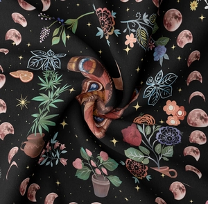 Detailed macro view showing the soft texture and floral butterfly print on the black tapestry