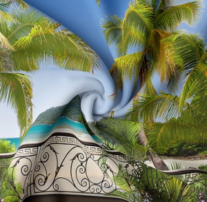 Detail of tropical beach tapestry fabric showing soft polyester texture and palm tree print