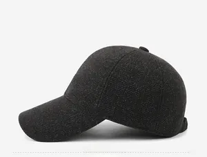 Detail of dark grey winter baseball cap showing textured wool fabric and side RD embroidery
