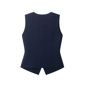 Rear view detail of dark blue knitted vest waistcoat featuring clean stitching and texture