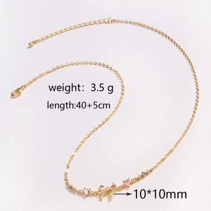 Detail view of bow pendant necklace with 3.5g weight and 40+5cm chain specifications