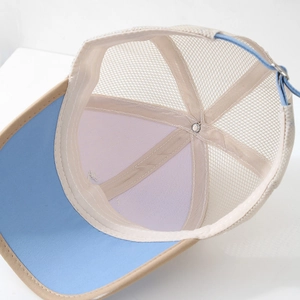 Internal view of mesh baseball cap showing breathable mesh and six-panel stitching detail