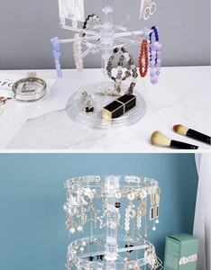Rotating acrylic jewelry organizer for necklaces and bracelets on vanity table