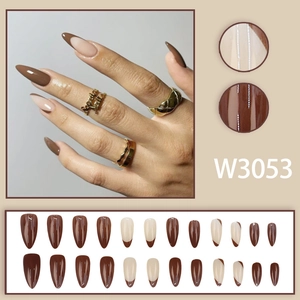 Silver wavy pointed press-on nails set in dark brown and nude French almond style