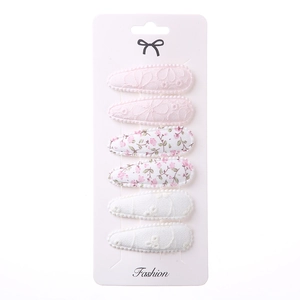 Detail of 6-piece water drop hair clips with sweet floral embroidery and lace fabric