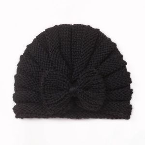 Detailed knit texture and layered bow on black baby turban hat with soft stretch fabric
