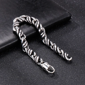 Detail of twisted cable men's steel bracelet with vintage silver finish and lobster clasp