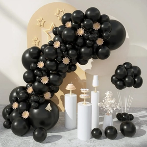 Matte black balloon arch kit with pink flowers and white butterfly party decoration