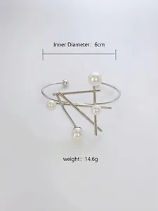 Detail view of irregular geometric silver bracelet with inner diameter and weight