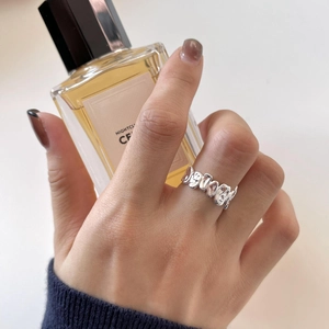 Irregular wavy S925 sterling silver ring with polished finish in minimalist design
