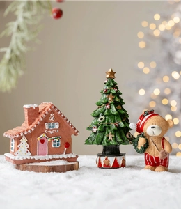 Miniature Christmas gingerbread house with resin pine tree and festive bear figurine