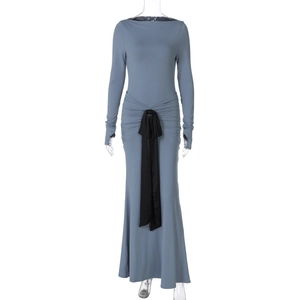 Detail of grey-blue long-sleeve dress featuring a black satin waist tie and ruched design