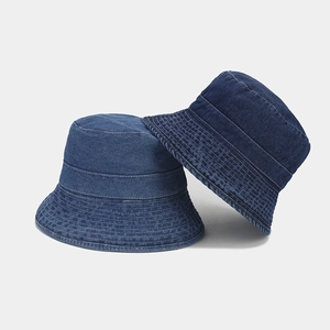 Classic denim bucket hats in dark and light blue colors with durable stitched brims