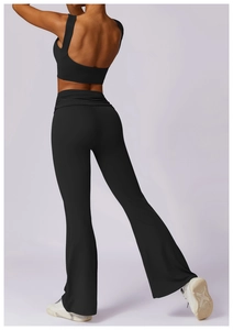 Rear view of black yoga set with flare leggings and supportive sports bra design