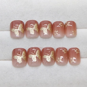 Short square gradient press-on nails with golden glitter butterflies and flowers