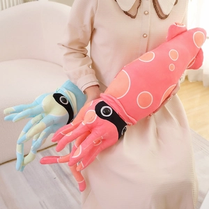 Pink and blue cartoon squid plush pillows with long tentacles in a home setting