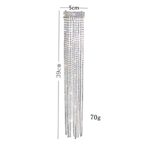 Elegant silver tassel ponytail clip with sparkling rhinestones and long fringe strands
