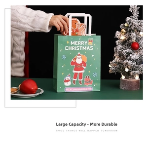 Detail of green Christmas gift bag with Santa illustration and flat white ribbon handle