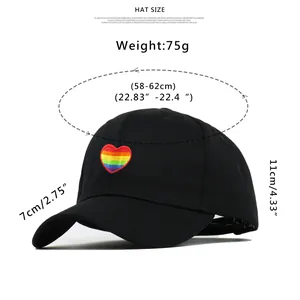 Detailed size chart for black cotton baseball cap with rainbow heart embroidery