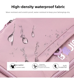 Detail showing high-density waterproof fabric texture with water droplets on pink backpack